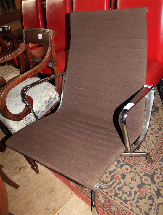 A Charles Eames aluminium chair, by Vitra,